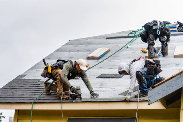 Professional Emergency Roof Repair technician working in Jacksonville, NY